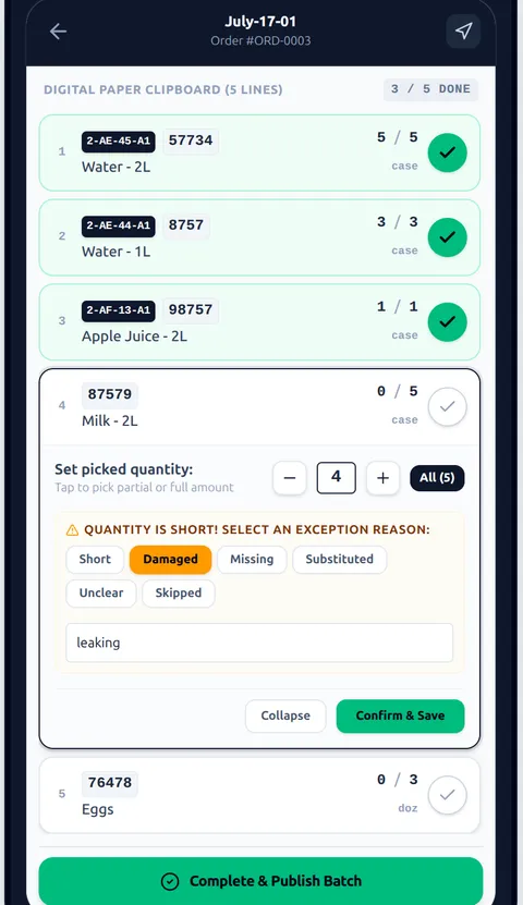 Picker entering a partial picked quantity and selecting a damaged-item exception reason with a note
